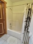 Second full bathroom with shower/tub combo